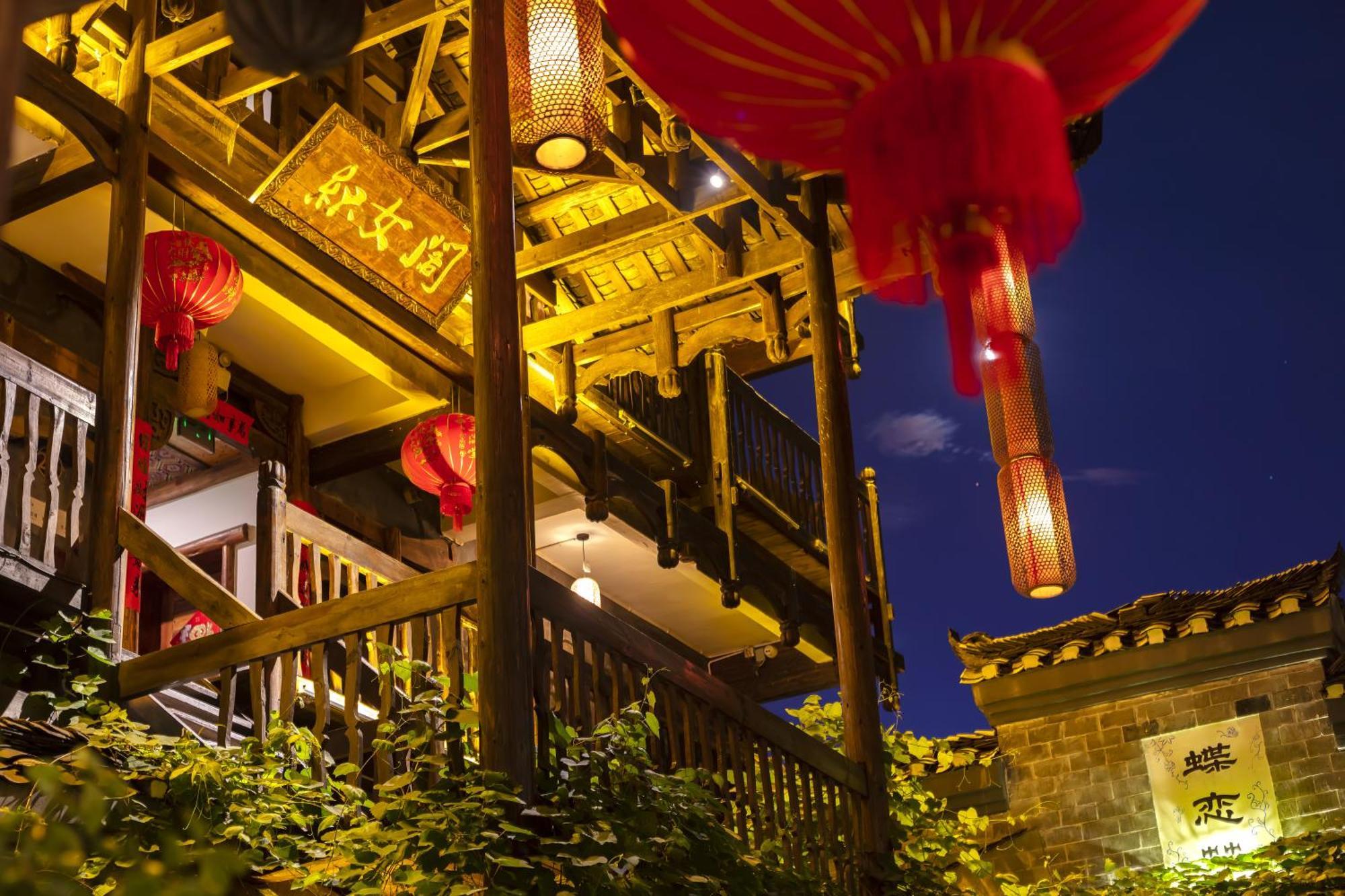 Butterfly Flowers Inn Чжанцзяцзе Экстерьер фото