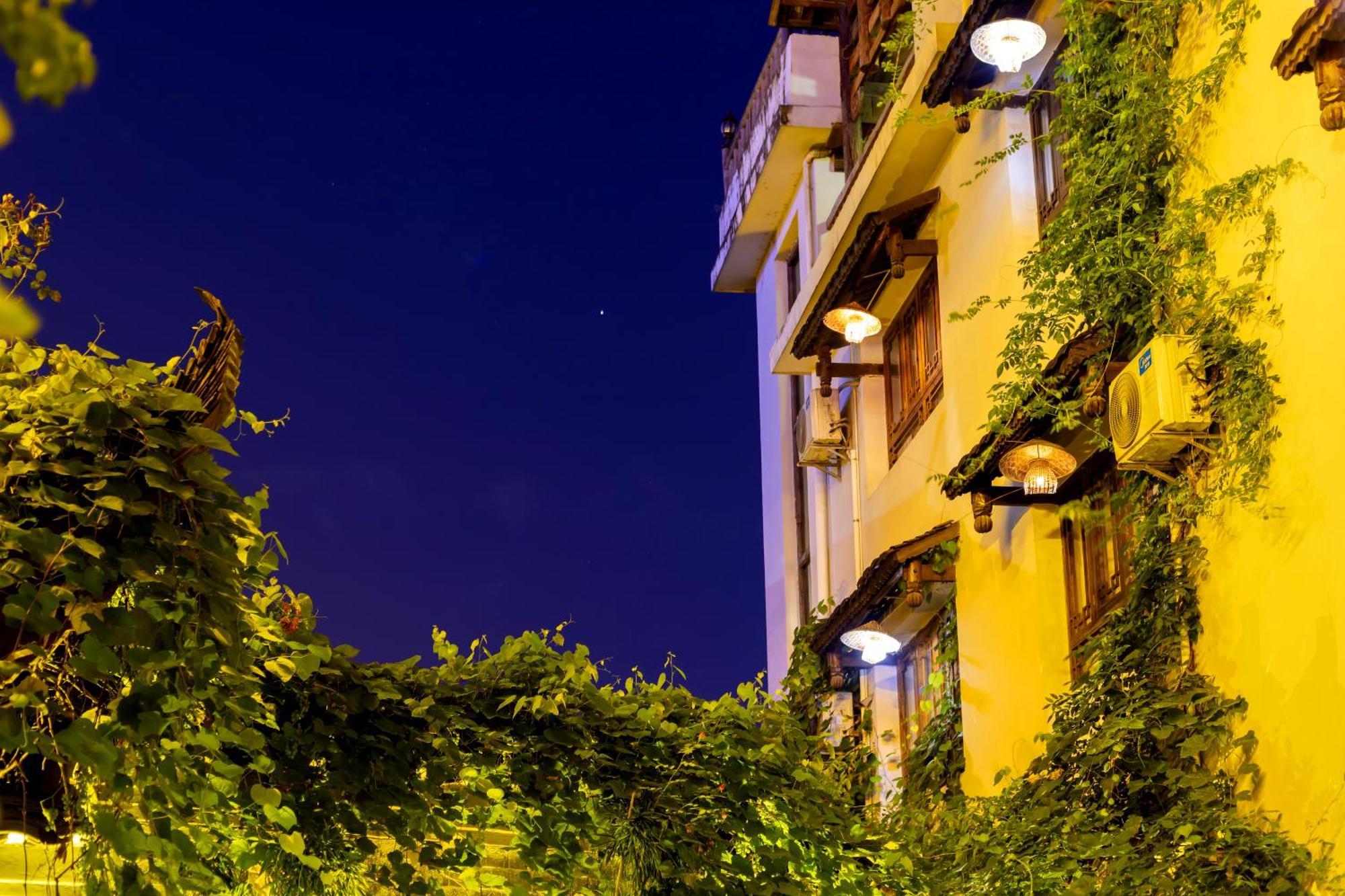 Butterfly Flowers Inn Чжанцзяцзе Экстерьер фото