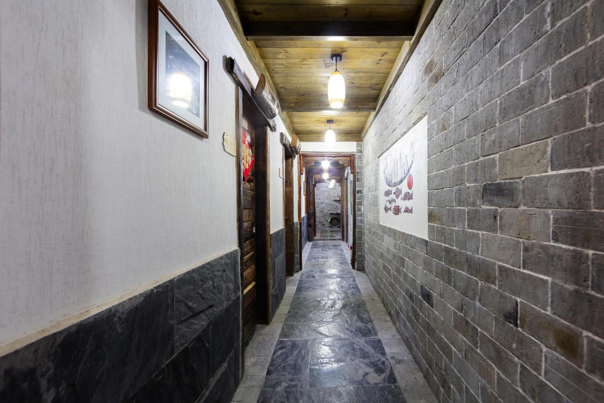 Butterfly Flowers Inn Чжанцзяцзе Экстерьер фото