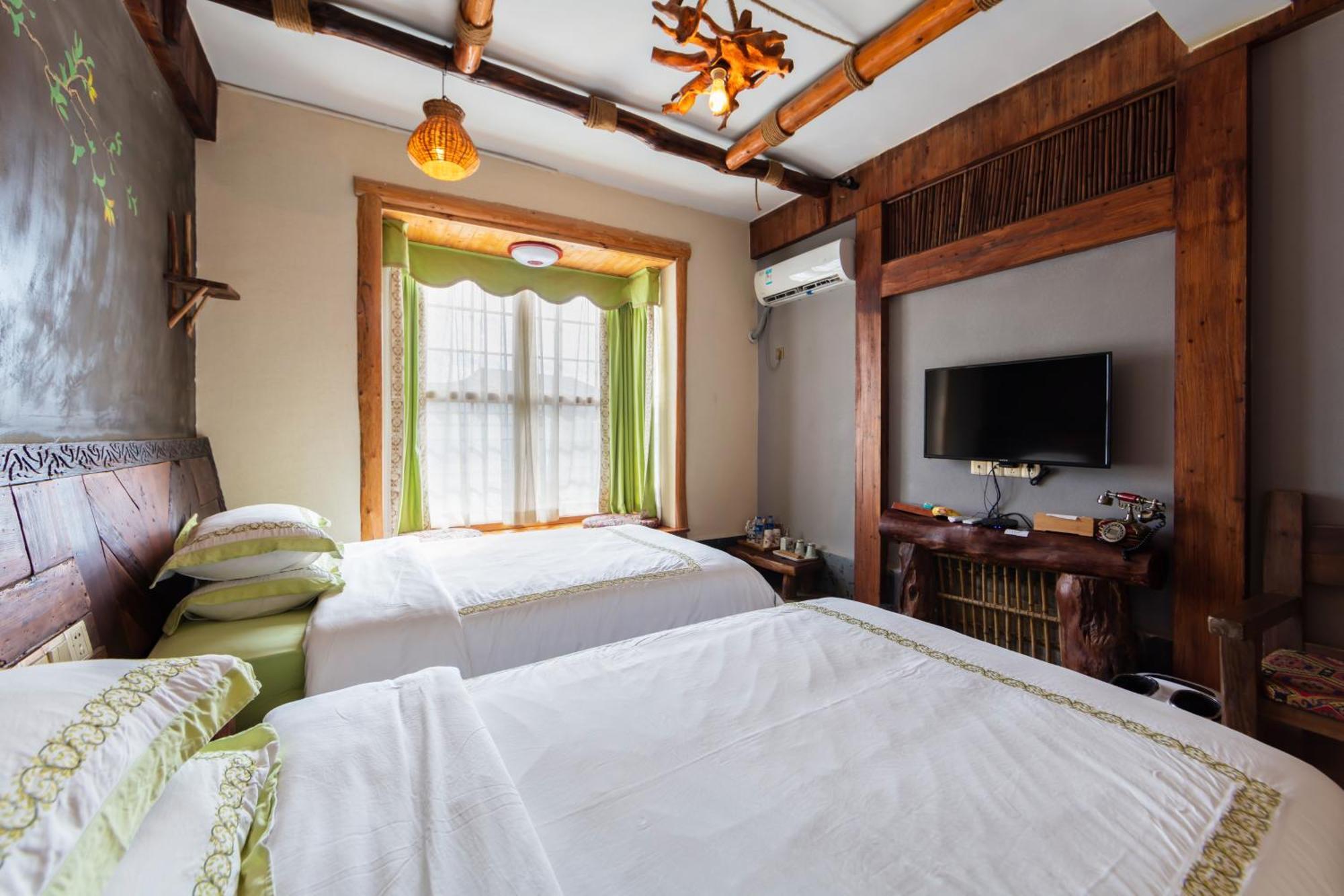 Butterfly Flowers Inn Чжанцзяцзе Экстерьер фото