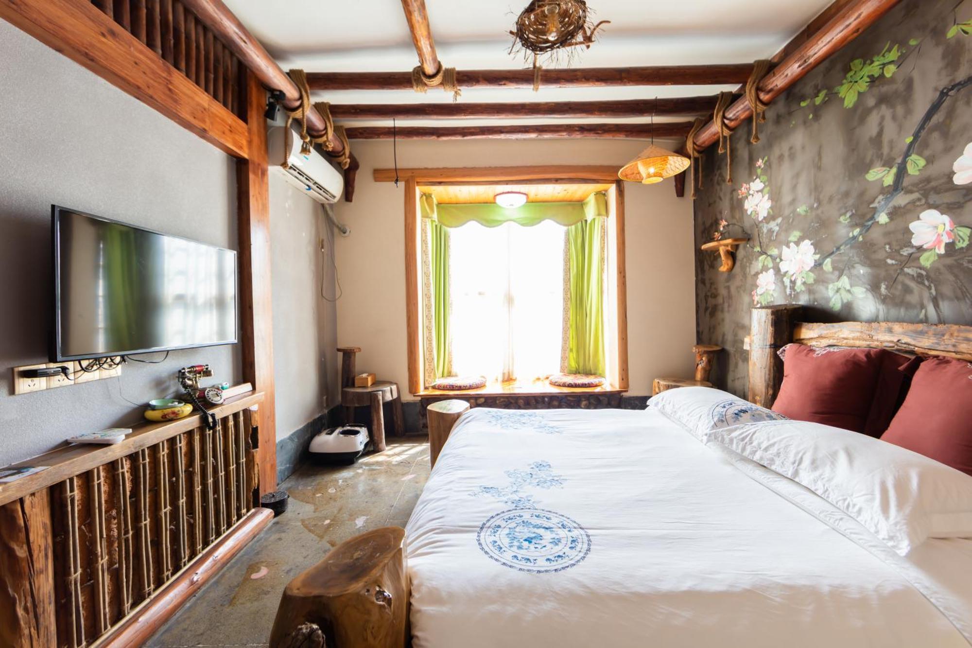 Butterfly Flowers Inn Чжанцзяцзе Экстерьер фото