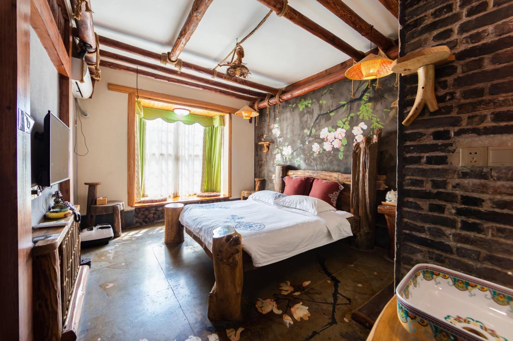Butterfly Flowers Inn Чжанцзяцзе Экстерьер фото