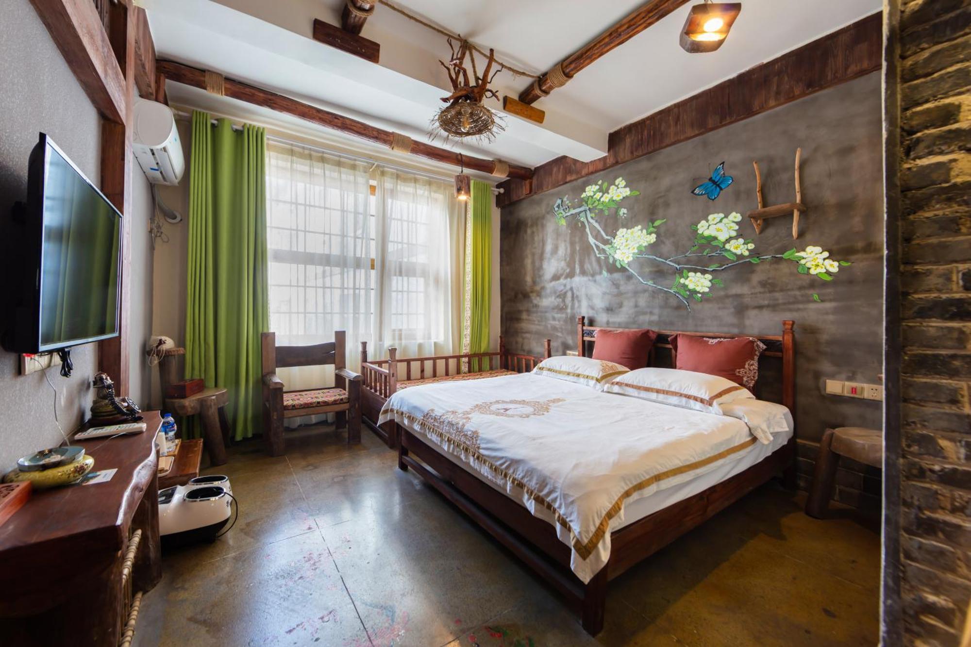 Butterfly Flowers Inn Чжанцзяцзе Экстерьер фото