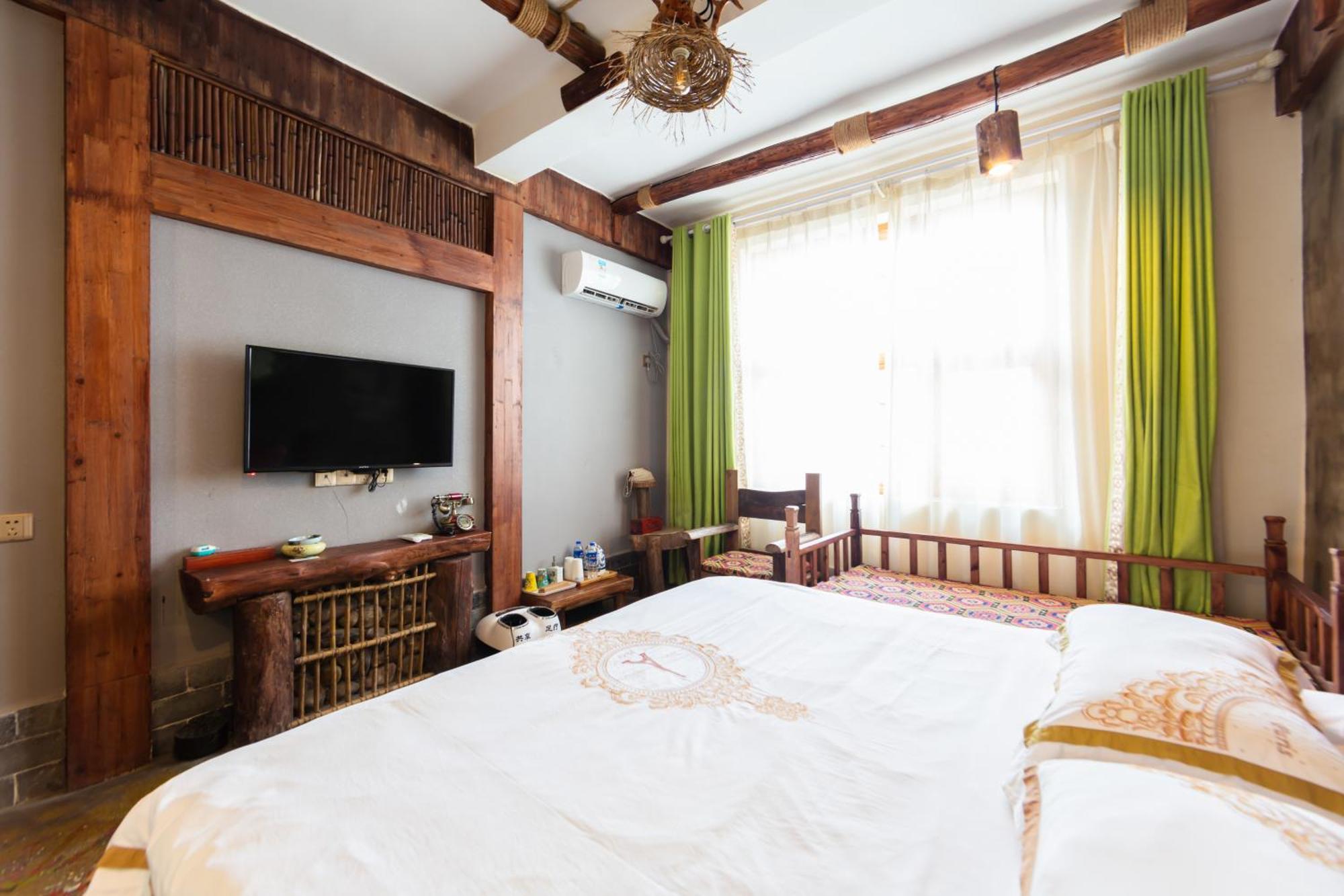 Butterfly Flowers Inn Чжанцзяцзе Экстерьер фото